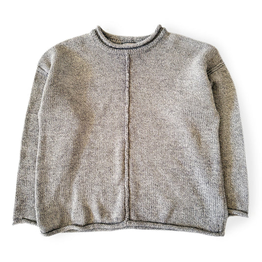 Gray knit sweater on a white background